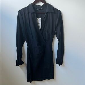 Black Sheath Dress with Plunge Neckline and Cuffed Sleeves